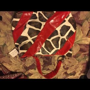 Red cow print shoulder bag